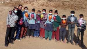 A group of girls and boys during a session.