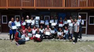 Teachers receiving their certificates