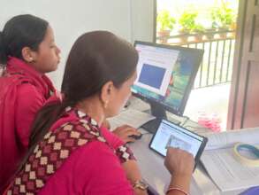 Participants learning to use digital devices