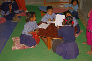 Small round tables for very young children
