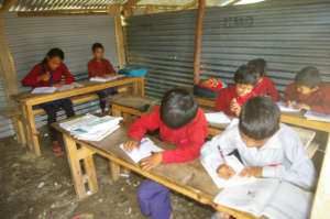 Pokhare Lower Secondary School students studying