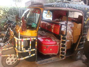 Rickshaw delivering books
