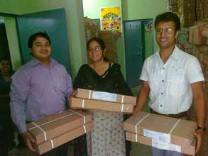 Our team delivering books to schools