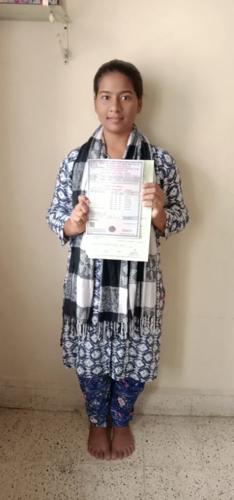 Aarti with her 12th std. Board results