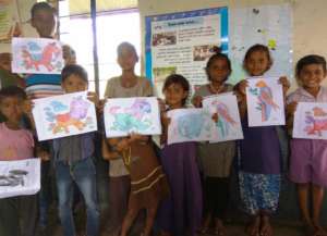 Priya enjoying drawing activity at school