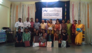 Rohini with performance gift .JPG