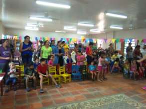 Boys and girls sharing with their parents