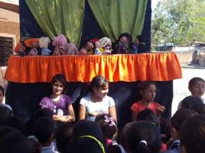 We prepared a play with puppets to bring to school