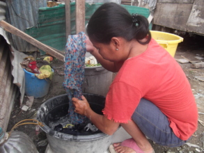 Doing others' laundry helps make ends meet.