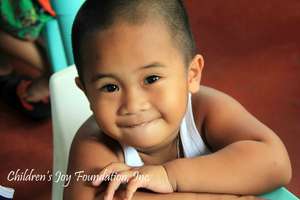 A welcome smile of a day care kid