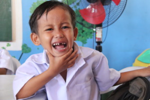 Jerwin, 4, enjoys learning in school.