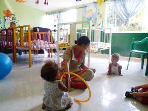The Pivijay children and one of their caretakers