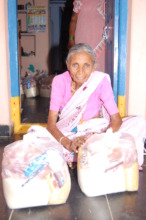 Donating food to poor elderly persons in india