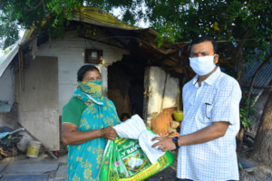 Elderly Persons getting Provisions Donation India