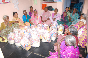 Groceries sponsorship to poor elderly woman in ind