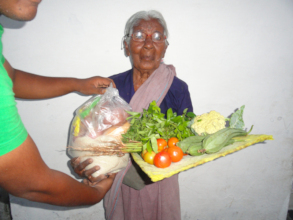 Old age woman receiving monghly groceries support