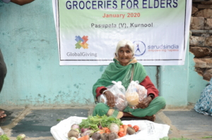 elderly persons getting food groceries kit monthly