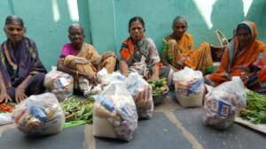 poor elderlypeople getting food groceries donation