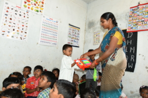 Educating a Child in India thru play items sponsor