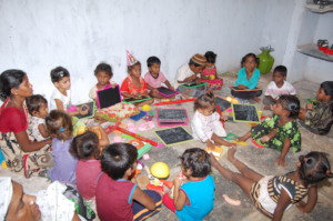 Education thru toys slates for poor children Donat
