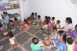 Kids having food at daycare centers andhra pradesh