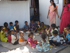 children are having meals at food sponsorship