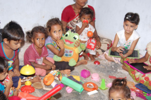 children are playing with toys in creche centers