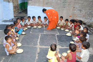serving meals to impoverished kids of poor parents