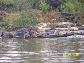 River travel in dugout canoe