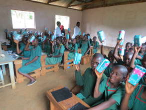 girls receiving sanitary towels