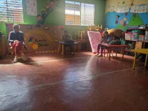 Daphne H. and teachers during a meeting