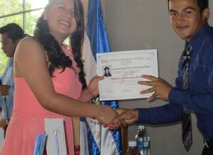 Jovy, graduating from ninth grade.