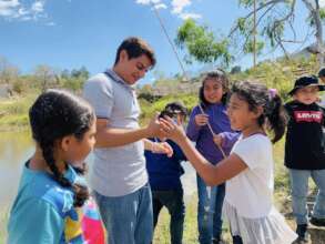 Students with the School's Director