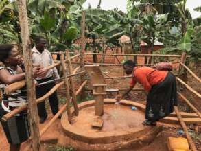 MCHI members evaluating a borehole