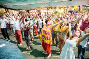 Laughing yoga during a Monte Sahaja retreat