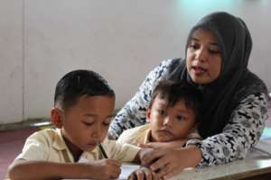 Kindergarten students and Miss Vicky