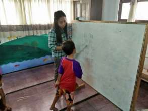 Fitriyah Spends Time With  a First Grade Student