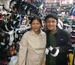 Choosing a pair of new shoes with mom