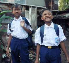 Agung (left) and Friend Going to School