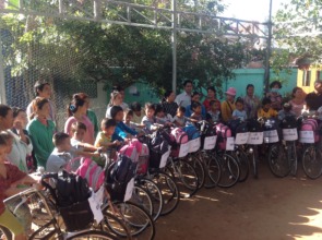 Students receiving their bikes & backpacks