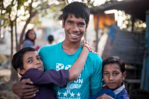 Two new boys with their new older brother