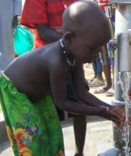 Boy at well