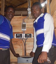Students examining the controllers
