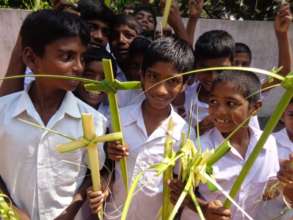 children enjoyed with palm leaves