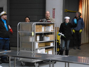 Staff double-checking inventory before loading.