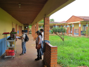 Karina w/ Hospital Director and Gov't Officials