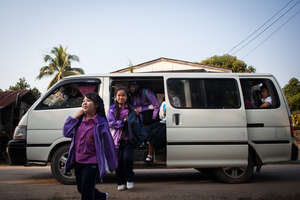 Girls arriving home from school