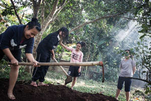 Digging an organic compost at the shelter home