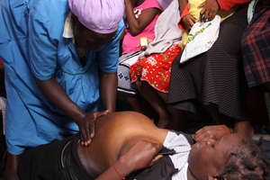 Midwife Demonstrating Examination Method