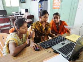 Girls learning Computers
